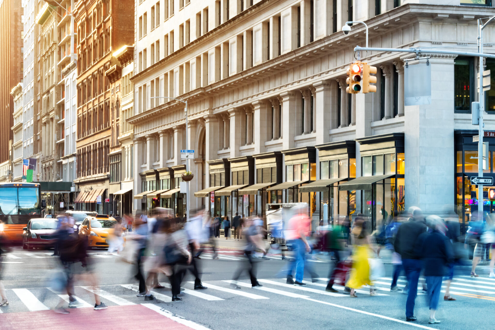 New York City street scene with crowds of diverse people in moti
