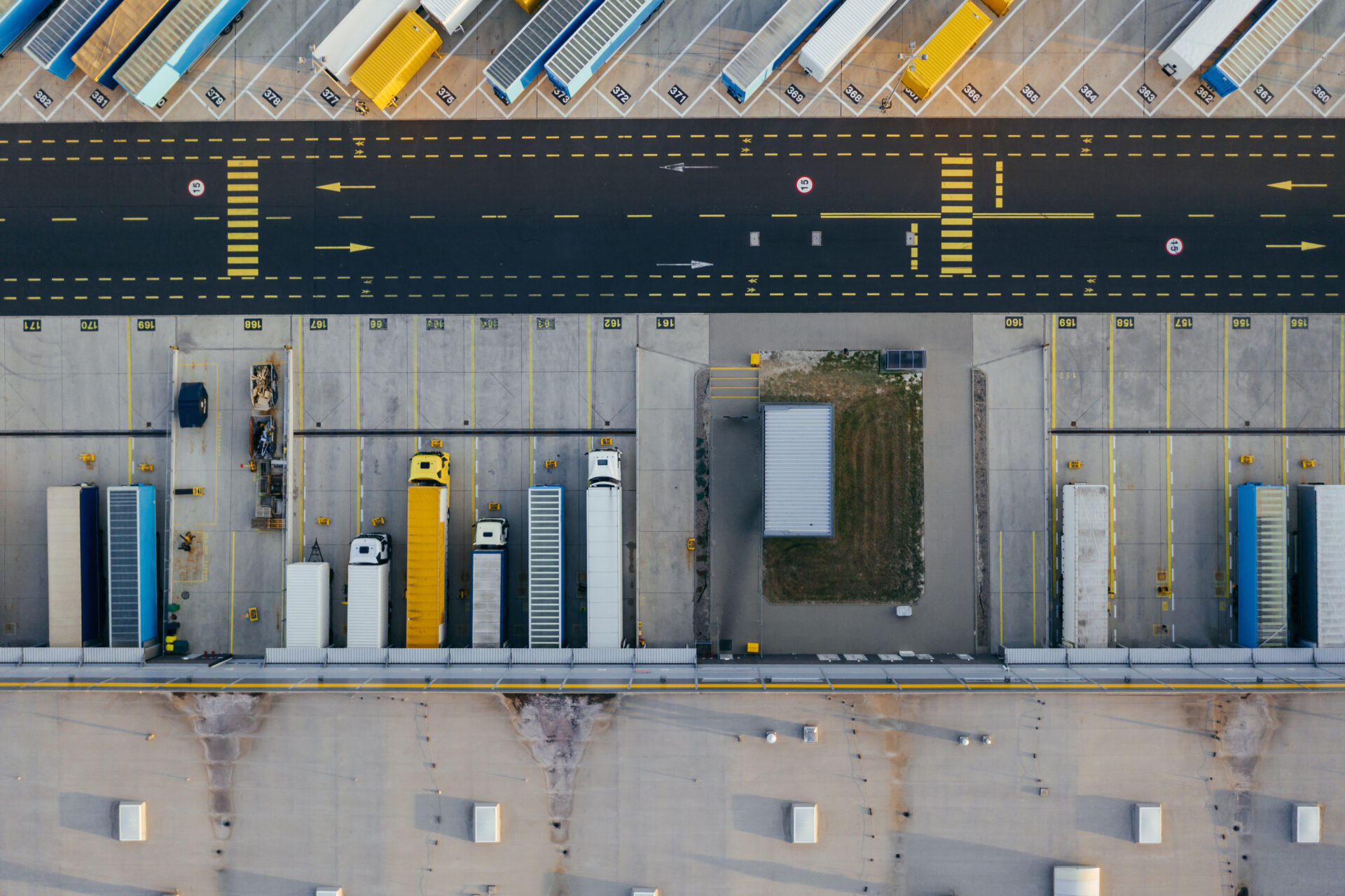 Aerial view of the distribution center, drone photography of the industrial logistic zone.